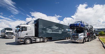 Prixcar trucks transporting cars