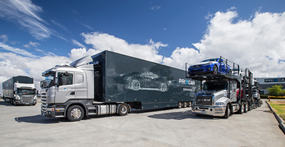 Prixcar trucks transporting cars