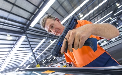 Prixcar employee performing vehicle maintenance